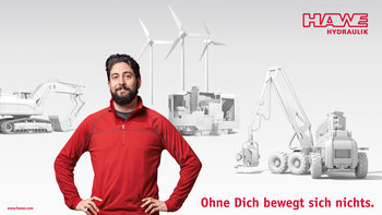 Motiv1 Hawe Kampagne - Mann vor Baumaschinen