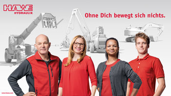 Motiv4 Hawe Kampagne - Gruppe von Mitarbeitern vor Baumaschinen