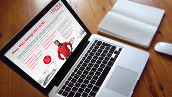 Aufgeklappter Laptop mit Übersicht HAWE Stellenangeboten