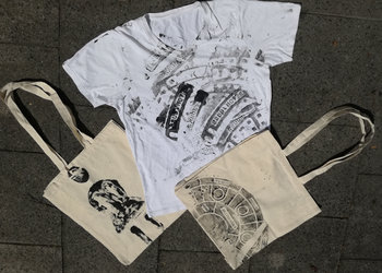 "Raubdruck" auf T-Shirts und Jutetaschen